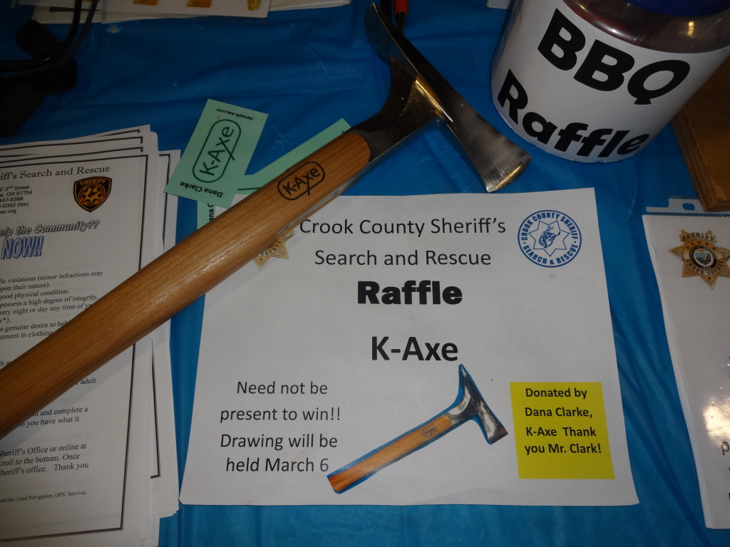 Crook County Sheriff's Search & Rescue Team booth at the Redmond Sportsmen's Show, Wilderness Axe donated for raffle. 